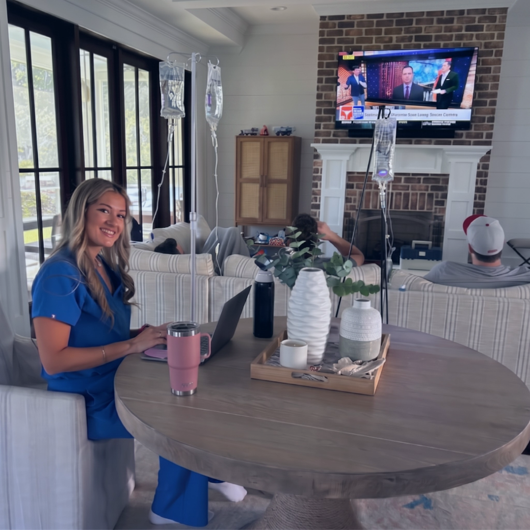 A Prime IV licensed nurse setting up in-home IV drips for a group relaxing in their Bluffton, SC living room