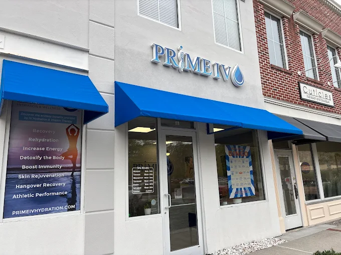 Prime IV Hydration & Wellness storefront with blue awnings in Bluffton, SC